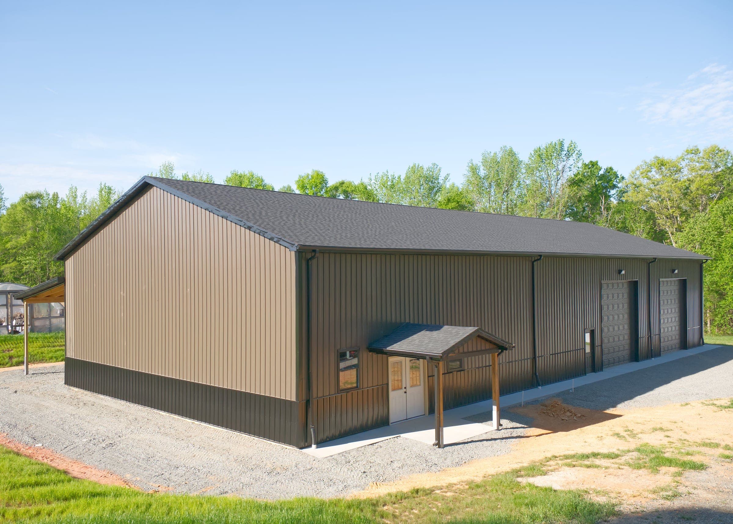 50x110 pole barn with lean-to, manufactured and delivered by Timber Building Company